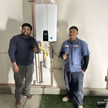 Tony's Plumbing - George and Oscar with our newly installed Navien Tankless Water Heater - Plumbing Near Me - Harbor City, California