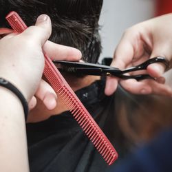 Tactical Grooming - Scissor-over-comb cutting to shape and refine the haircut.