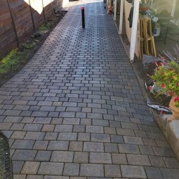 Block by Nick - A walkway from the front of the house to the back that also added more patio to their backyard - Landscaping Near Me Block by Nick - A walkway from the front of the house to the back that also added more patio to their backyard - Landscaping Near Me