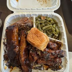 Ribs, teriyaki Parmesan wings, teriyaki Parmesan corn, and green beans.