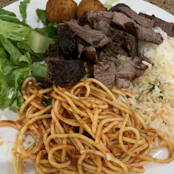Oliveira's Steak House - Sirloin steak, spaghetti, rice and salad veggies - Brazilian Near Me - Boston, Massachusetts Oliveira's Steak House - Sirloin steak, spaghetti, rice and salad veggies - Brazilian Near Me - Boston, Massachusetts
