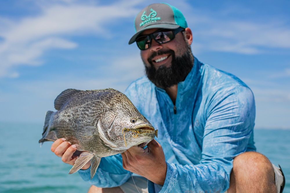 Lowe Tide Fishing Charters Logo