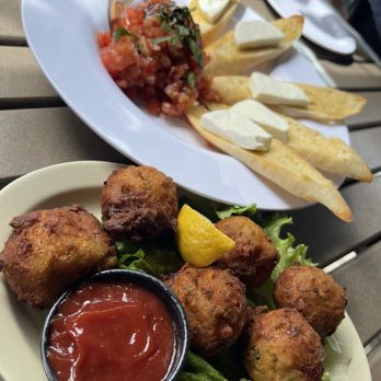 Flying Monkeys - Conch Fritters & Bruschetta - Beer, Wine & Spirits Near Me - Key West, Florida Flying Monkeys - Conch Fritters & Bruschetta - Beer, Wine & Spirits Near Me - Key West, Florida
