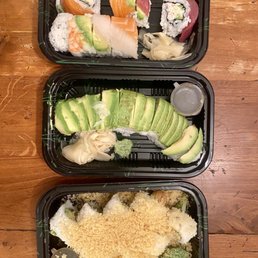 two trays of sushi two trays of sushi