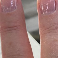 Mindy's Nails - The nails started cracking the very next day. They refuse to back their work.