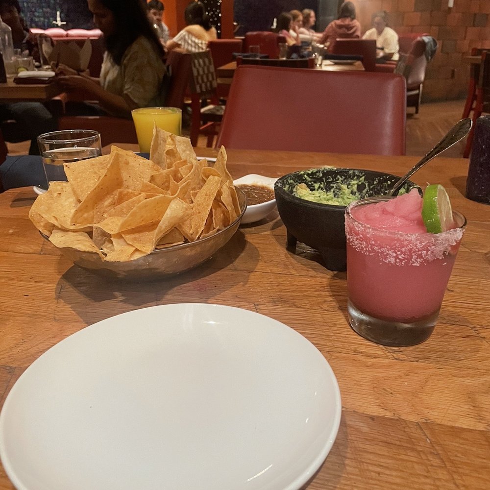 Rosa Mexicano - Guacamole en Molcajete and Frozen Pomegranate Margarita - Mexican Near Me - Boston, Massachusetts Rosa Mexicano - Guacamole en Molcajete and Frozen Pomegranate Margarita - Mexican Near Me - Boston, Massachusetts