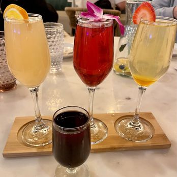 Mamimosas - Signature Mimosa Flight & a pomegranate liqueur - Breakfast & Brunch Near Me - West Covina, California Mamimosas - Signature Mimosa Flight & a pomegranate liqueur - Breakfast & Brunch Near Me - West Covina, California