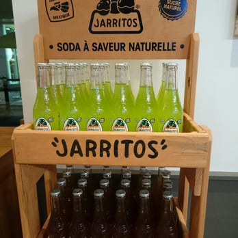 Quesada Burritos & Tacos - a display of jarritos - Mexican Near Me - Quebec City, Quebec Quesada Burritos & Tacos - a display of jarritos - Mexican Near Me - Quebec City, Quebec