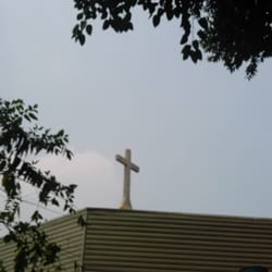 Holy Eucharist Parish - Look for the low building with a cross