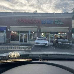 Corazon Latino Hair Salon - That's the guy that came and sat down and that's the barber.