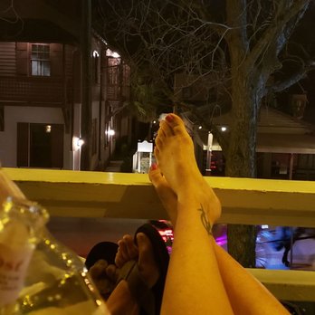 Old Powder House Inn - Relaxing on the porch swing and having a drink on the upstairs veranda - Bed & Breakfast Near Me - Saint Augustine, Florida Old Powder House Inn - Relaxing on the porch swing and having a drink on the upstairs veranda - Bed & Breakfast Near Me - Saint Augustine, Florida