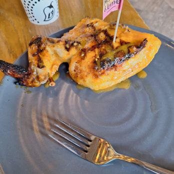 Nando's Peri-Peri - 1/4 Chicken Breast with Mango & Lime sauce - Chicken Shop Near Me - Katy, Texas Nando's Peri-Peri - 1/4 Chicken Breast with Mango & Lime sauce - Chicken Shop Near Me - Katy, Texas