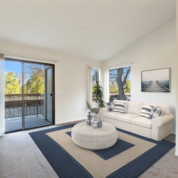 Lakeshore - 2 bed living room with sliding glass doors out to patio - Apartments Near Me - Antioch, California Lakeshore - 2 bed living room with sliding glass doors out to patio - Apartments Near Me - Antioch, California