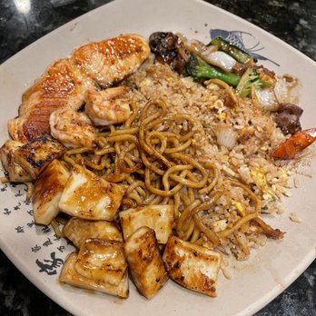 Sakura - Hibachi Combination w/ salmon, calamari, and fried rice - Sushi Bars Near Me - Kapolei, Hawaii Sakura - Hibachi Combination w/ salmon, calamari, and fried rice - Sushi Bars Near Me - Kapolei, Hawaii