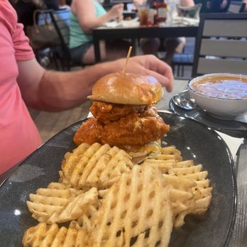 Walk-on’s - Buffalo chicken sandwich with waffle fries - Cajun/Creole Near Me - Cape Coral, Florida Walk-on’s - Buffalo chicken sandwich with waffle fries - Cajun/Creole Near Me - Cape Coral, Florida