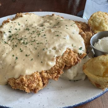 Moonshine Grill - Chicken fried steak with potatoes and corn muffins - Southern Near Me - Austin, Texas