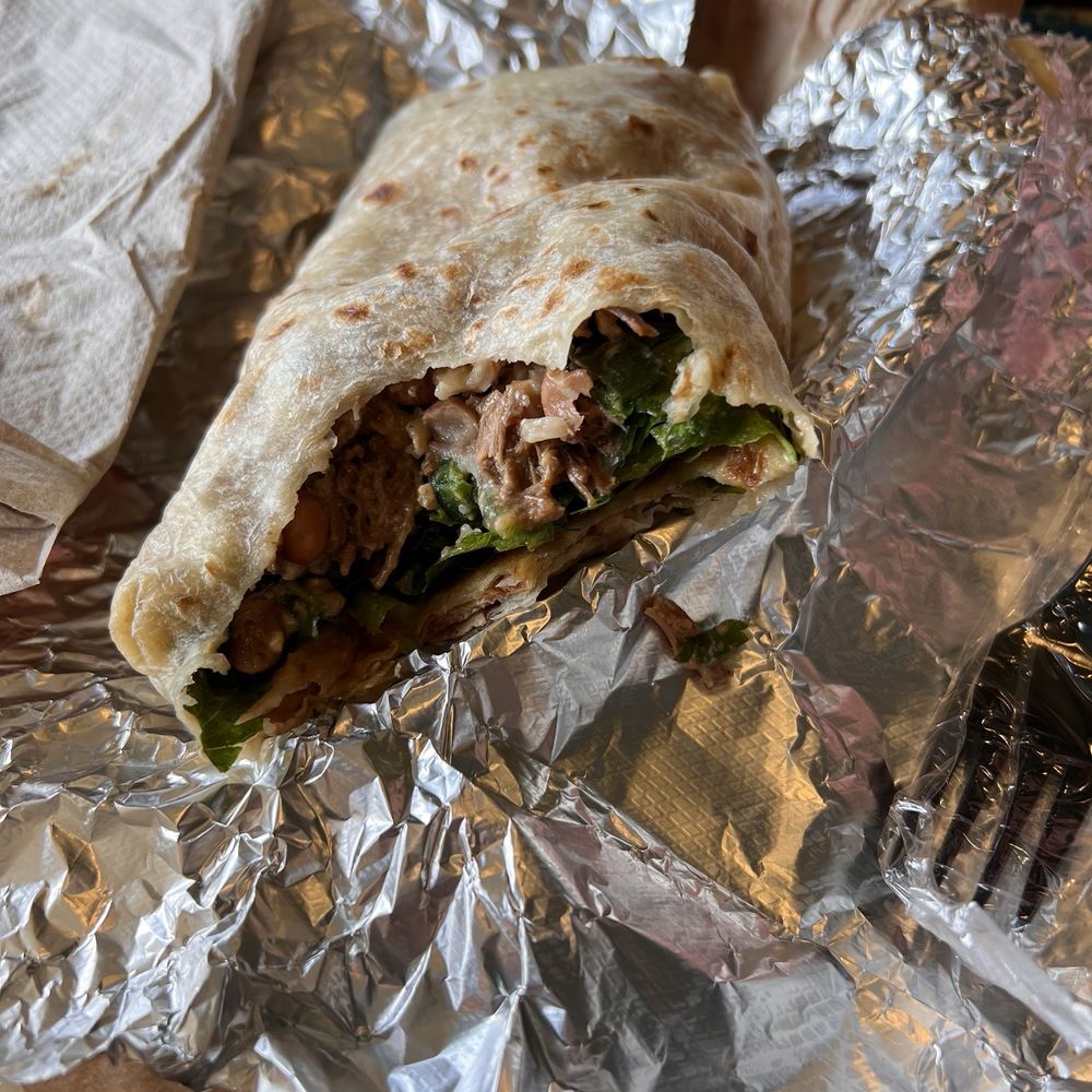 Brisket queso burrito with buttermilk tortilla