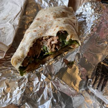 Cabo Bob's Burritos - Brisket queso burrito with buttermilk tortilla - Mexican Near Me - Austin, Texas