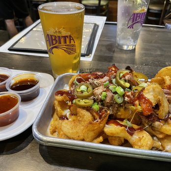 Bubba’s Bones & Brews - Sidewinder Fries and various bbq sauces. - Gastropubs Near Me - Cathedral City, California Bubba’s Bones & Brews - Sidewinder Fries and various bbq sauces. - Gastropubs Near Me - Cathedral City, California
