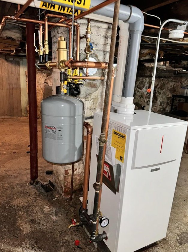 Slide of MP Plumbing and Heating