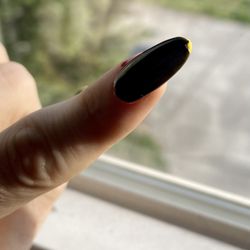 Mystique Nails & Spa - Chipped polish, left index finger