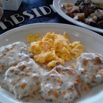 Curbside Cafe - Biscuts and gravy with 2 eggs scrambled , yummy, had the wifes home style potatos - Breakfast & Brunch Near Me - Vista, California