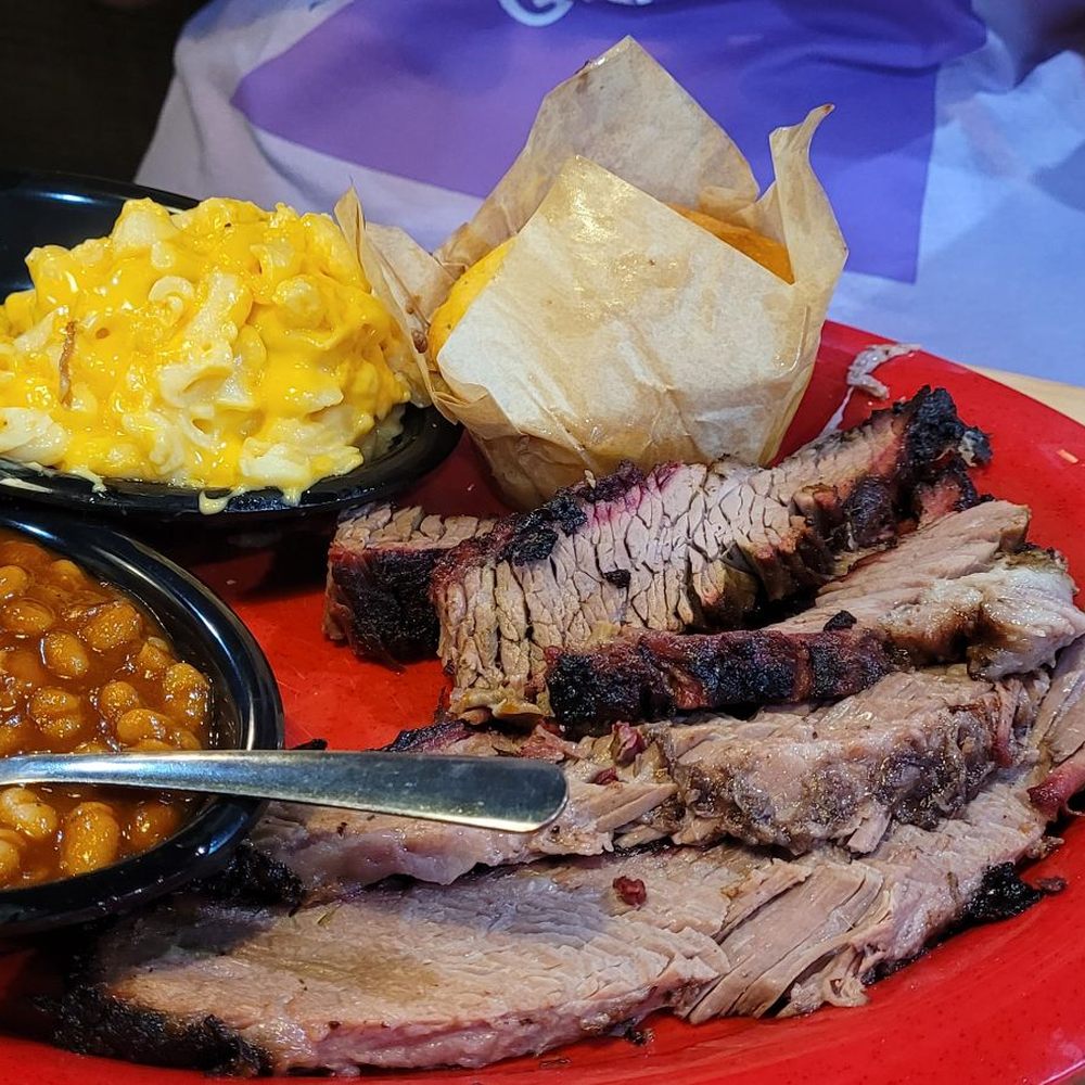 Sliced Brisket, Mac & cheese, baked beans, corn bread. DELICIOUS Sliced Brisket, Mac & cheese, baked beans, corn bread. DELICIOUS