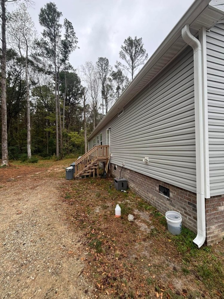 Slide of Triple GGG's Seamless Gutters