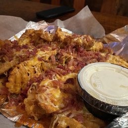 a plate of food with a dip