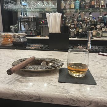 Pairings Cigar Bar - a glass of whiskey and a cigar - Bars Near Me - Media, Pennsylvania