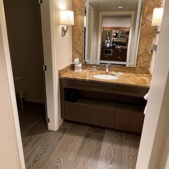 Little America Hotel - Vanity sink and small mirror in right - Hotels Near Me - Flagstaff, Arizona