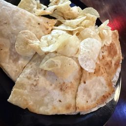 Buffalo chicken quesadillas with potato chips. Buffalo chicken quesadillas with potato chips.