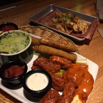 Applebee's Grill + Bar - The sampler and the Sriracha shrimp. - American Near Me - Watertown, New York Applebee's Grill + Bar - The sampler and the Sriracha shrimp. - American Near Me - Watertown, New York