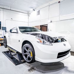 Muscle Wraps - Track pack paint protection film going on this Nismo 370Z!
