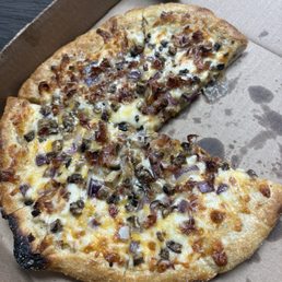 10-inch garlic & olive oil with bacon, onion, mushrooms, and Romano cheese. 10-inch garlic & olive oil with bacon, onion, mushrooms, and Romano cheese.