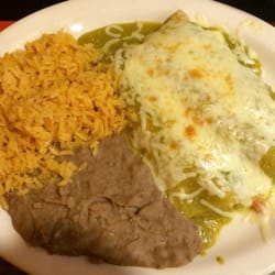 Green chicken enchiladas with rice and beans.