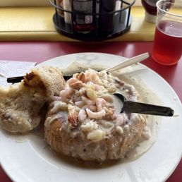 Loaded Dungeness crab and shrimp chowder in a sourdough bread bowl