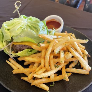 Traxx Restaurant - Angus Burger with crispy hot garlicky fries, yum! - New American Near Me - Los Angeles, California Traxx Restaurant - Angus Burger with crispy hot garlicky fries, yum! - New American Near Me - Los Angeles, California