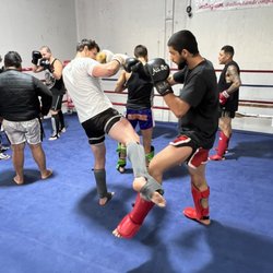 Toro Z Muay Thai and Fitness - Practicing blocking leg kicks in the advance class.