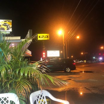 Chimi Tropical - a view of a restaurant at night - Dominican Near Me - Tampa, Florida Chimi Tropical - a view of a restaurant at night - Dominican Near Me - Tampa, Florida