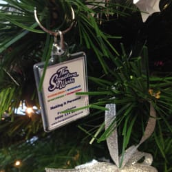 The Signature Works - Alternative Christmas decor on tree. Branded key ring.Genius