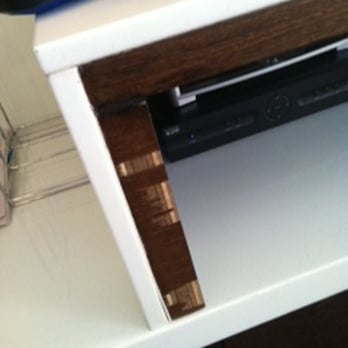 Hotel Le Bleu - peeling veneer on desk - Hotels Near Me - Brooklyn, New York