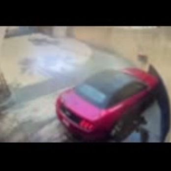 Tsunami Car Wash - Apparently this is not the first time they've driven a car into the wall, they have a pad on it! - Car Wash Near Me - Palm Desert, California