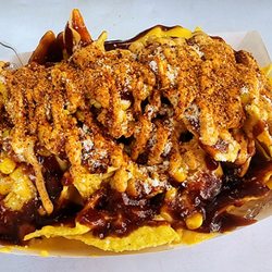 Rockin Rooster Food Truck - Our secret menu Elote Nachos, the best of both worlds!