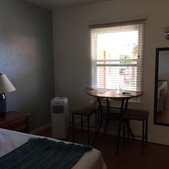Patriots' Boutique Motel - Little table and the air conditioner. - Hotels Near Me - San Clemente, California Patriots' Boutique Motel - Little table and the air conditioner. - Hotels Near Me - San Clemente, California