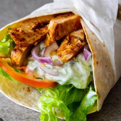 Melina's Grill - Mediterranean Wrap - Chopped lettuce, red onions, sliced tomatoes, tzatziki suace and feta cheese!