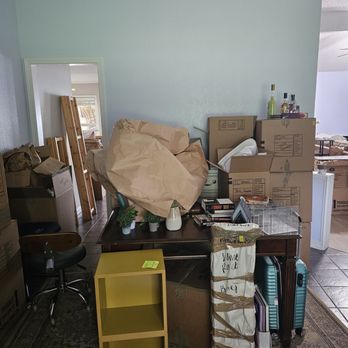 Action Mobility - Packages from trailer and items still needing to be packed - Movers Near Me - Bossier City, Louisiana Action Mobility - Packages from trailer and items still needing to be packed - Movers Near Me - Bossier City, Louisiana