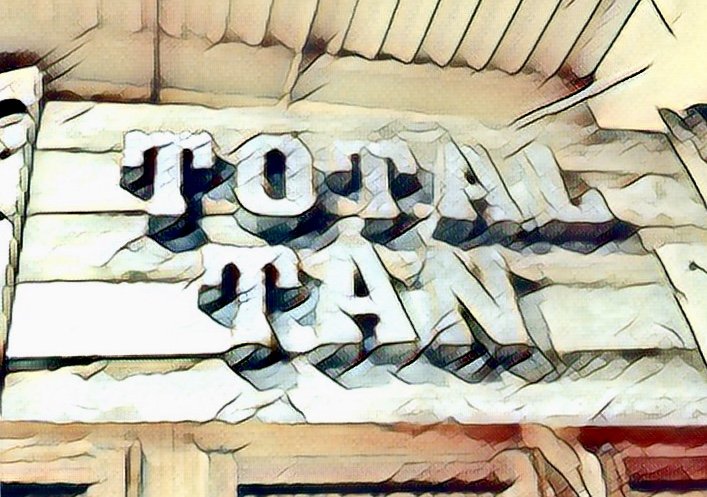 Total Tan & Boutique Neenah Logo