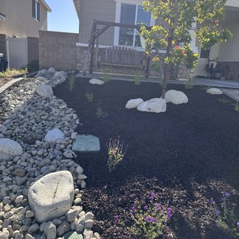 Green Diamond Landscape  - Patio, entry pavers, river rock flood control, wood chips, irrigation, boulders, plants, gopher prevention, weed barrier. - Landscaping Near Me - Yucaipa, California