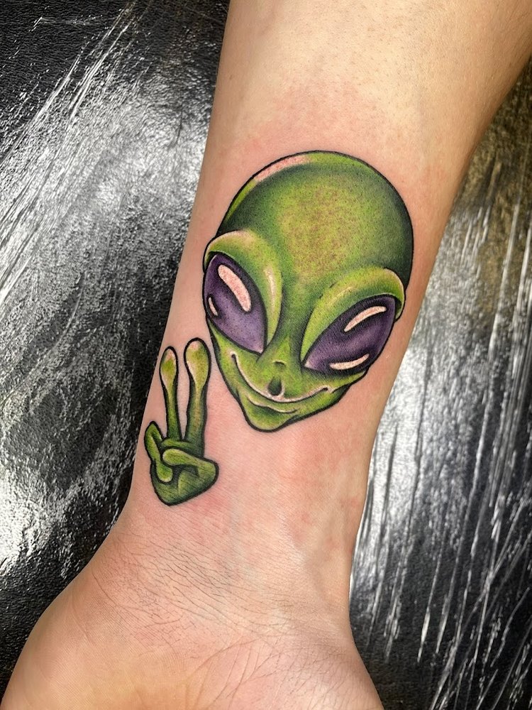 Todo Amor Tattoo Photos